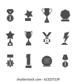 Set trophy winner award icon collection isolated on white background. Prizes and rewards silhouettes vector illustration.
