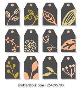 A set of twelve chalkboard style labels with hand drawn floral elements.