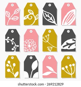 A set of twelve hand drawn floral design labels in pink, green and dark gray, isolated on white.