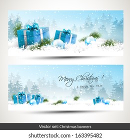 Set of two Christmas banners with blue gift boxes in snow