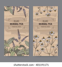 Set of two color vintage labels for peppermint and chamomile herbal tea. Placed on cardboard texture.