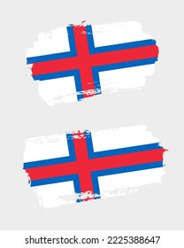 Set of two creative brush painted flags of Faroe Islands country with solid background