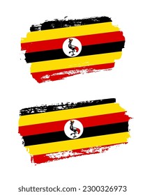 Set of two creative brush painted flags of Uganda country with solid background