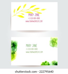 Set of two creative business card templates with artistic vector design. Green paint stains and yellow branch of leaves.