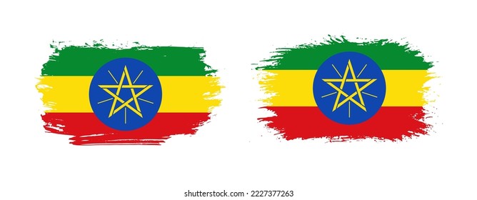 Set of two grunge brush flag of Ethiopia on solid background