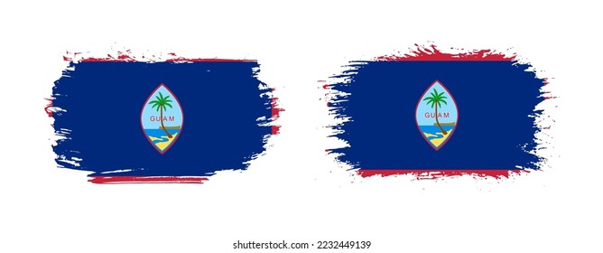 Set of two grunge brush flag of Guam on solid background
