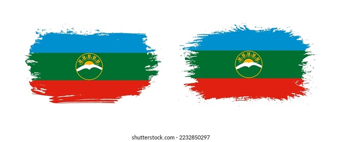 Set of two grunge brush flag of Karachay-Cherkessia on solid background