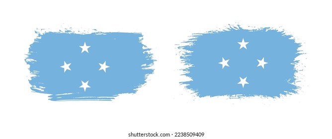 Set of two grunge brush flag of Micronesia on solid background