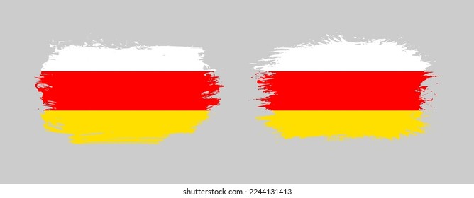 Set of two grunge brush flag of South Ossetia on solid background