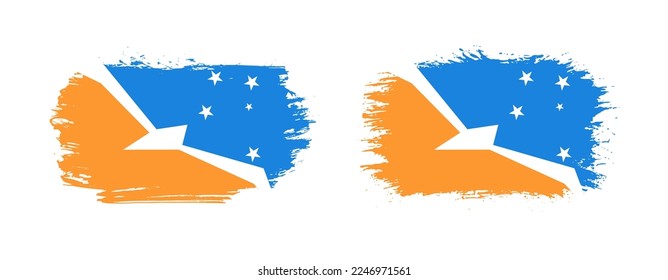 Set of two grunge brush flag of Tierra del Fuego Province, Argentina on solid background