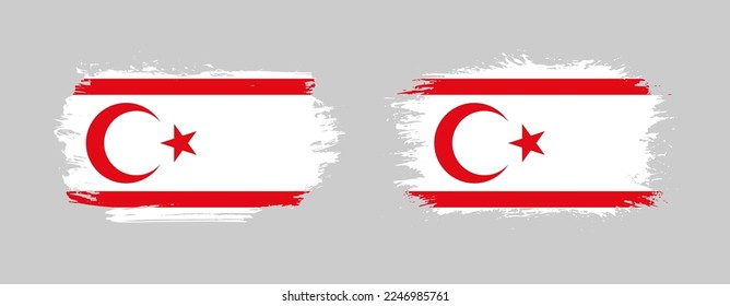 Set of two grunge brush flag of Turkish Republic of Northern Cyprus on solid background