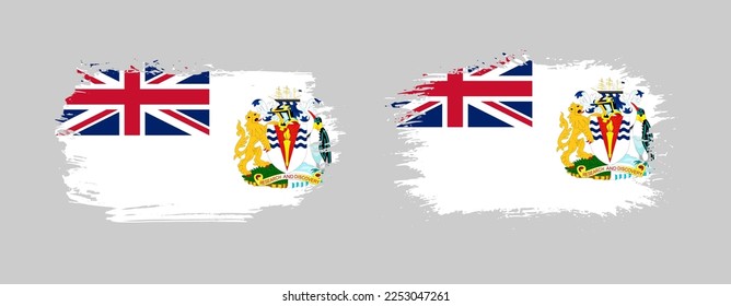 Set of two grunge brush flag of British Antarctic Territory on solid background