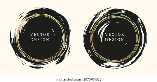 Set of two grunge brush stroke round elements. Circle painted background decorated by hand-drawn golden frames. 