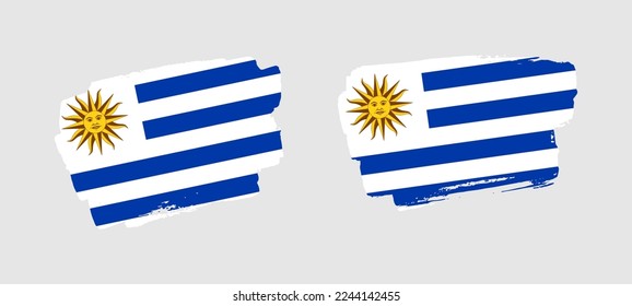 Satz von zwei handgemalten Uruguay-Pinselfahnen auf solidem Hintergrund