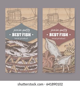 Set of two labels with fishing boat, color fish and seafood basket placed on cardboard texture. Great for markets, fishing, fish processing, canned fish, seafood product label design.