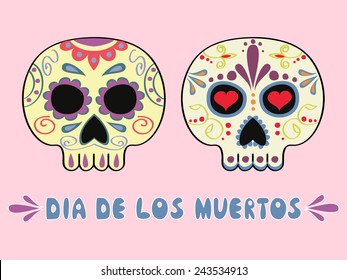 set of two Mexican decorated sculls and text Dia de los Muertos