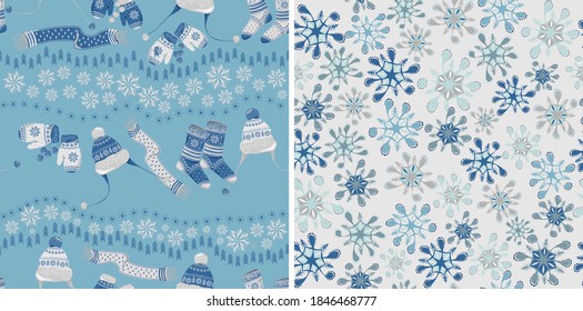 Set of two seamless vectors with warm clothing elements isolated on blue background and snowflakes, on gray. Mittens, socks, scarves, hats with blue and white ornaments