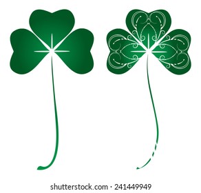 Set of two stylized images of green clover in vector.