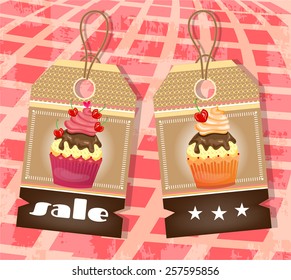 Set of two tags with cupcakes with small cherries and chocolate cream