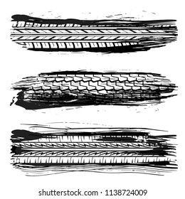 Set of two white tire tracks isolated on black grunge splash lines