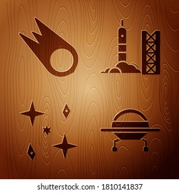Set UFO flying spaceship, Comet falling down fast, Falling stars and Rocket launch from the spaceport on wooden background. Vector