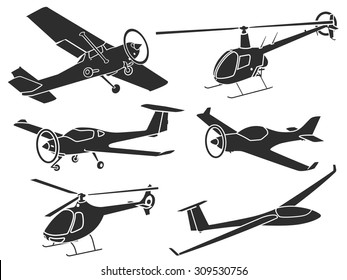 Set of ultra-light sport airplanes sillhouettes.