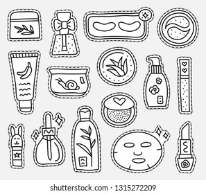 Set of uncolored stickers or patches with asian cosmetics isolated on grey background.