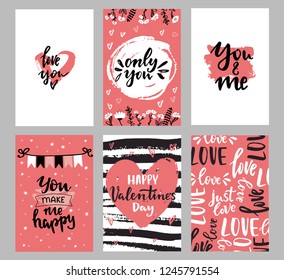 Set of Valentine's day greeting cards with hand written lettering greeting words and floral wreaths and branches and brush strokes on background