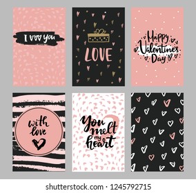 Set of Valentine's day greeting cards with hand written greeting lettering and decorative textured brush strokes on background. Happy Valentine's day, Love you words