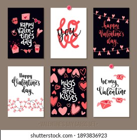 Set Valentine's Day greeting cards with lettering and decorative hand drawn love elements. Vector illustration for season invitations, cards, posters and flyers.