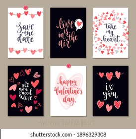 Set Valentine's Day greeting cards with lettering and decorative hand drawn love elements. Vector illustration for season invitations, cards, posters and flyers.