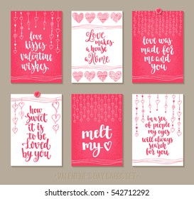 Set Valentine's Day greeting cards with handwritten brush calligraphy and decorative elements. Decorative vector illustration for season invitations, cards, posters and flyers.