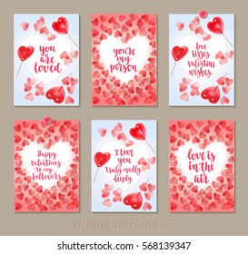 Set Valentine's Day greeting cards with handwritten brush calligraphy and sweet candy hearts and lollipops. Decorative vector illustration for season invitations, cards, posters and flyers.