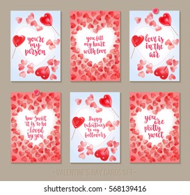 Set Valentine's Day greeting cards with handwritten brush calligraphy and sweet candy hearts and lollipops. Decorative vector illustration for season invitations, cards, posters and flyers.
