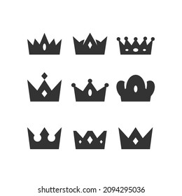 Set of variant vector black silhouettes of crowns, isolated on a white background.