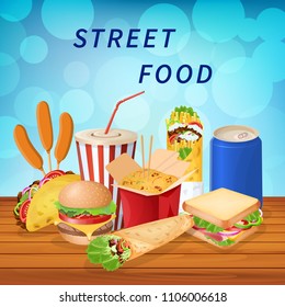 A set of varied street food and fast food on a wooden table and on a blue bokeh background. Vector illustration
