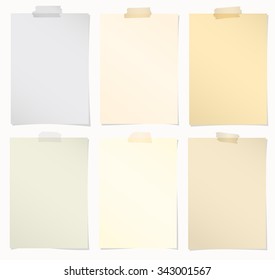 Set of various colors note papers with adhesive tape on white background