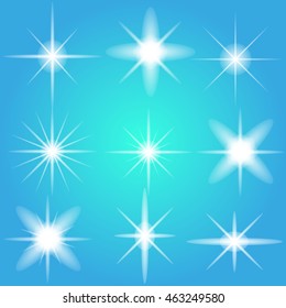 set of various forms of sparks  on a blue background