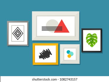 Set of various frames for pictures and photos on wall.