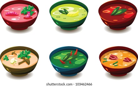 Set of various tasty soups in colorful bowls