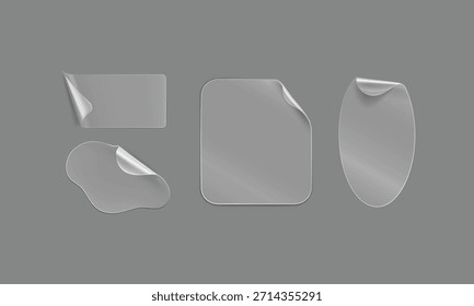 Set of various transparent blank adhesive stickers peeling off with curled corners on gray background