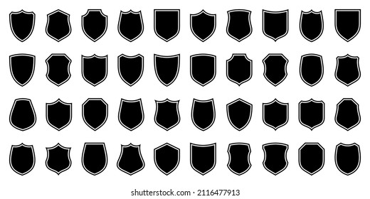 Set of various vintage shield icons. Black outlined heraldic shields. Protection and security symbol, label. Vector illustration.