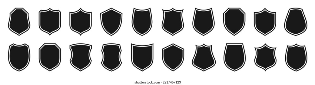 Set of various vintage shield icons. Black outlined heraldic shields. Protection and security symbol, label. Vector illustration.