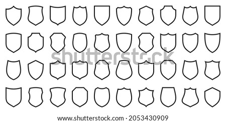 Set of various vintage shield icons. Black heraldic shields. Protection and security symbol, label. Line art. Vector illustration.