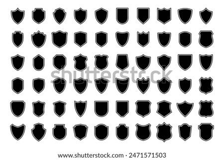 Set of various vintage shield icons. Black outlined heraldic shields. Protection and security symbol, label. Vector illustration.