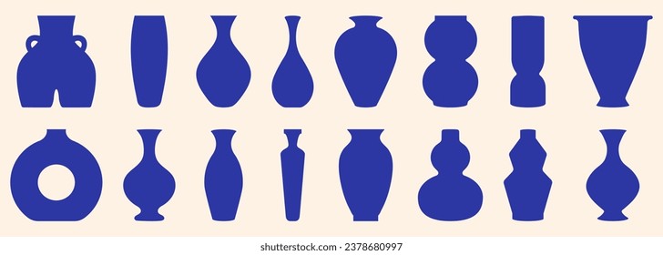 Set of vases with different shapes and forms. Dark blue colored geometric pottery
