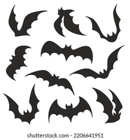Set of vector bat black silhouettes with different angle and wings spread isolated on white.