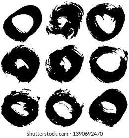 Set of vector black rings on a white background made with a dry brush