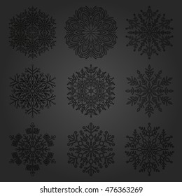 Set of vector black snowflakes. Fine winter ornament. Snowflakes collection