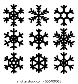 Set of vector black snowflakes. Isolated silhouettes on white background